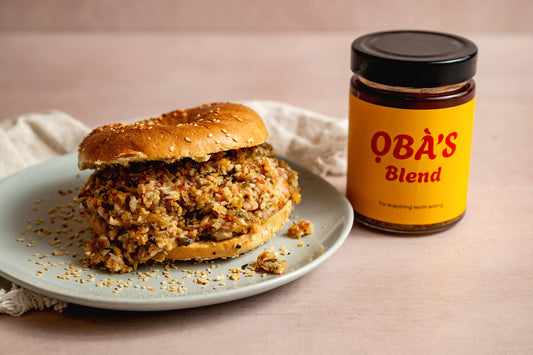 The ỌBÀ Blend Salmon Brioche — ỌBÀ'S BLEND smashed avocado and smoked salmon in a toasted sesame brioche bun