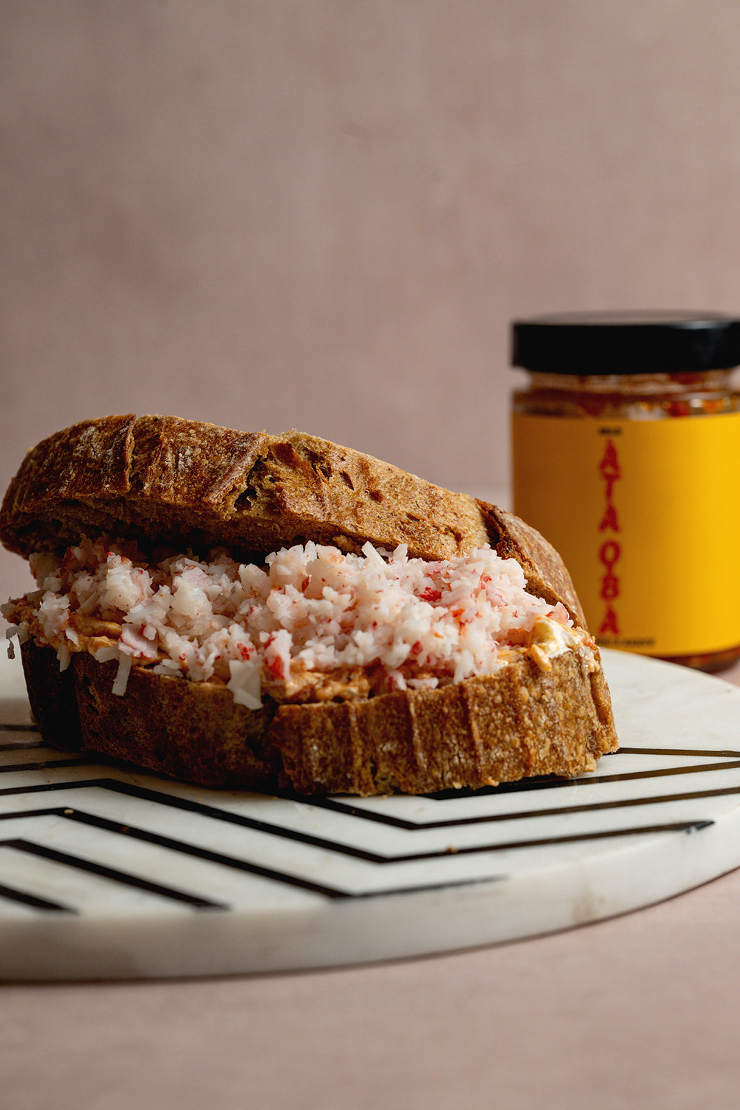 The Lagos Melt — ỌBÀ’S BLEND smashed avocado and smoked salmon on sourdough