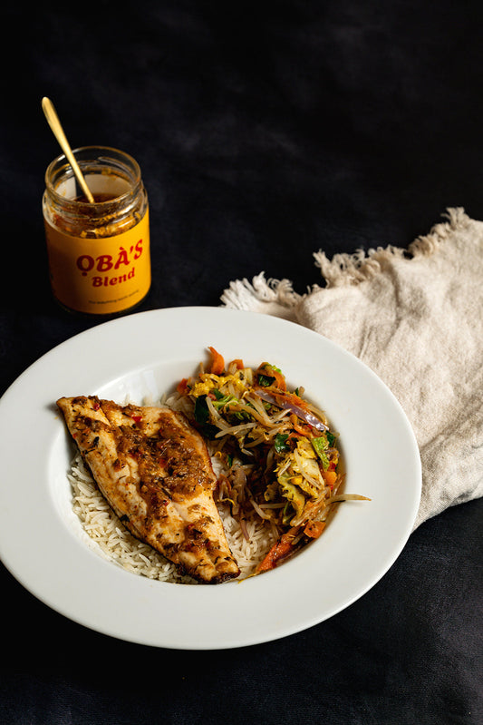 The ỌBÀ Pilaf — pan-seared fish with ỌBÀ’S BLEND vegetables and white rice
